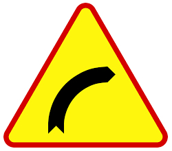 Znak drogowy A-1: niebezpieczny zakręt w lewo.